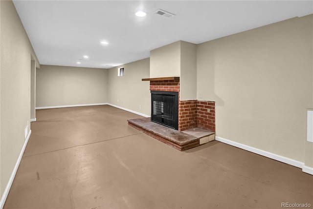 4559 Ashfield Dr, Boulder, CO 80301 - unfurnished living room featuring concrete flooring, a fireplace, and recessed lighting