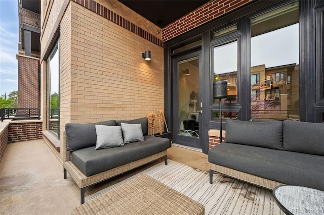 view of patio / terrace featuring an outdoor living space and a balcony