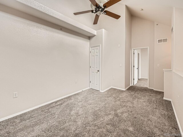 16366 E Fremont Ave Unit 11, Aurora, CO 80016 - carpeted empty room featuring a ceiling fan, high vaulted ceiling, and baseboards