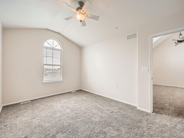 16366 E Fremont Ave Unit 11, Aurora, CO 80016 - spare room with ceiling fan, carpet, vaulted ceiling, and baseboards