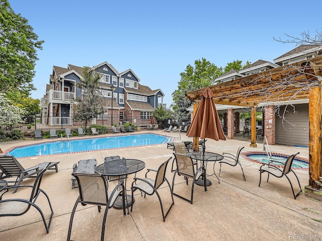 16366 E Fremont Ave Unit 11, Aurora, CO 80016 - community pool featuring a patio area, a hot tub, and a pergola