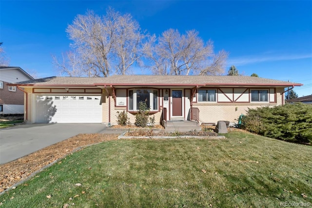 ranch-style home featuring a front lawn and a garage