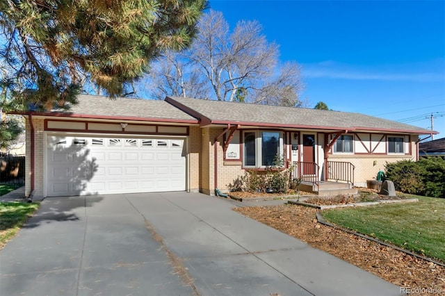 ranch-style house with a front yard and a garage