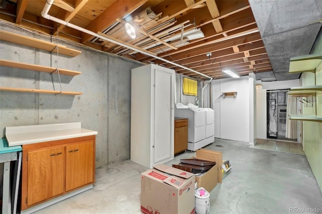 basement with washing machine and dryer