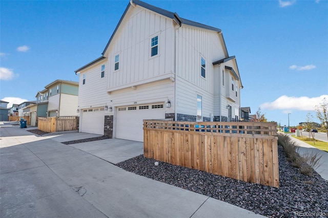 view of property exterior with a garage