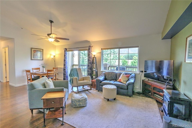 539 River View Dr Unit 1305, New Castle, CO 81647 - living room with vaulted ceiling, wood finished floors, and a ceiling fan
