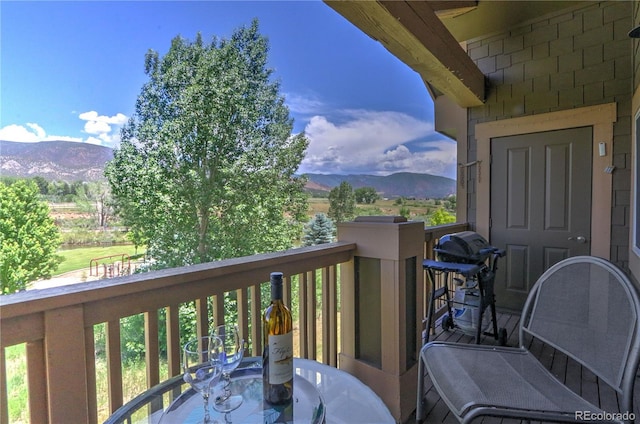539 River View Dr Unit 1305, New Castle, CO 81647 - balcony featuring a mountain view, outdoor dining area, and area for grilling