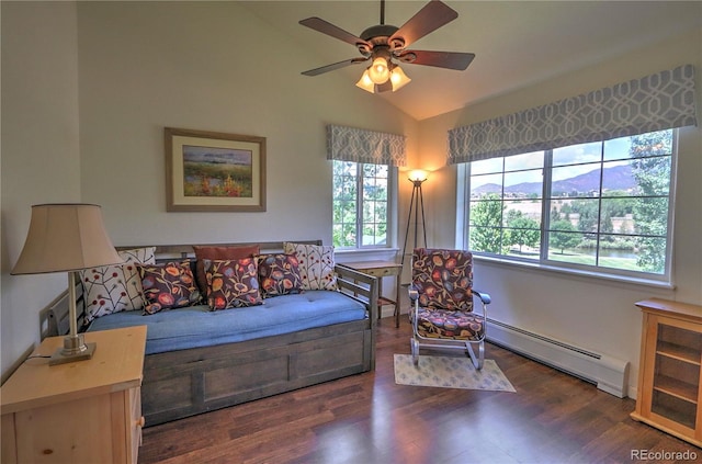 539 River View Dr Unit 1305, New Castle, CO 81647 - living area featuring a baseboard radiator, lofted ceiling, wood finished floors, and ceiling fan