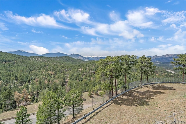 1015 Nob Hill Rd, Evergreen, CO 80439 - property view of mountains featuring a wooded view