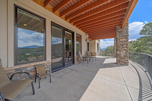 1015 Nob Hill Rd, Evergreen, CO 80439 - view of patio with a balcony
