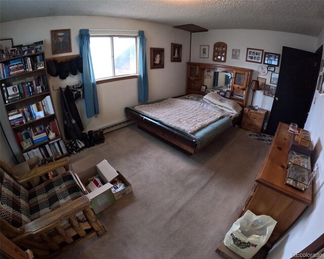 11798 Sidney Rd, Golden, CO 80403 - bedroom with a baseboard radiator, carpet, and a textured ceiling