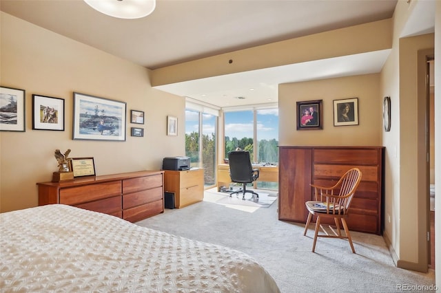 bedroom featuring baseboards, carpet, floor to ceiling windows, and access to outside