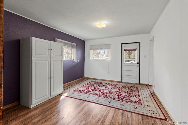 116 E 12th St, Leadville, CO 80461 - foyer entrance featuring baseboards and wood finished floors