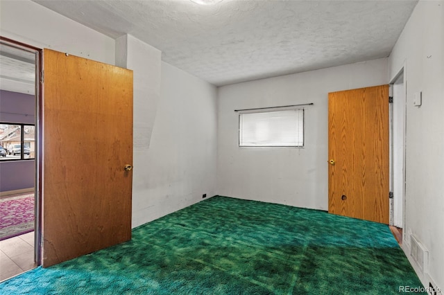 116 E 12th St, Leadville, CO 80461 - carpeted empty room with a textured ceiling and visible vents