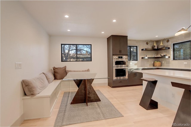 dining space featuring light hardwood / wood-style flooring and breakfast area