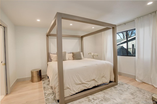 bedroom featuring light hardwood / wood-style flooring