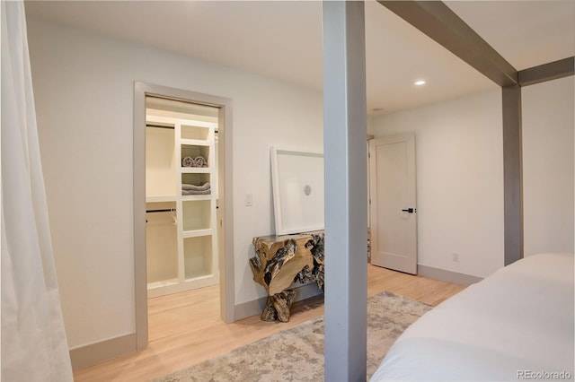 bedroom with light wood-type flooring