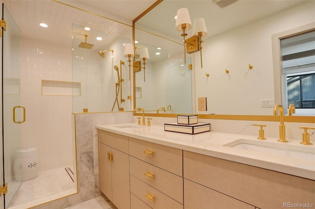 bathroom with tile patterned floors, a shower with shower door, and vanity