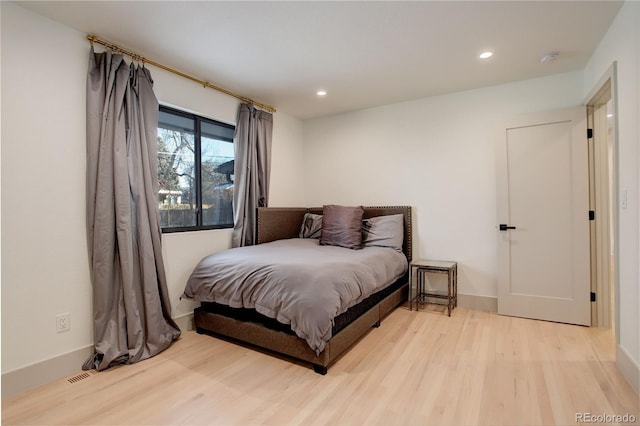 bedroom featuring light hardwood / wood-style flooring