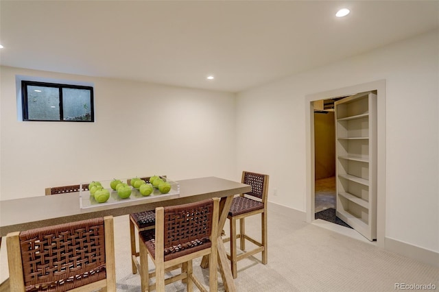 view of carpeted dining space