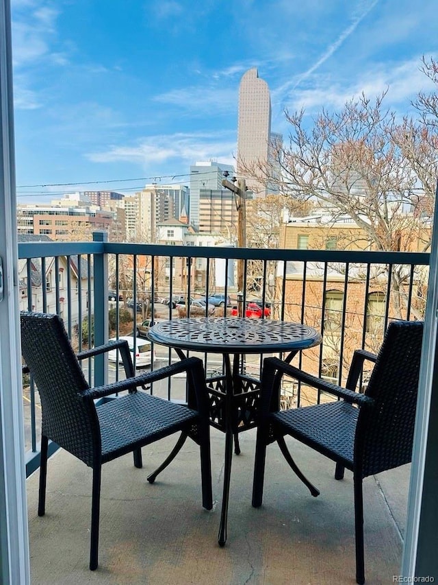 balcony featuring a view of city