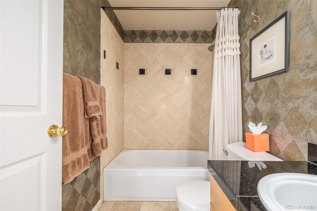 full bath featuring toilet, shower / tub combo, tile walls, vanity, and tile patterned floors