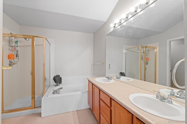 full bathroom with a bath, a shower stall, and a sink