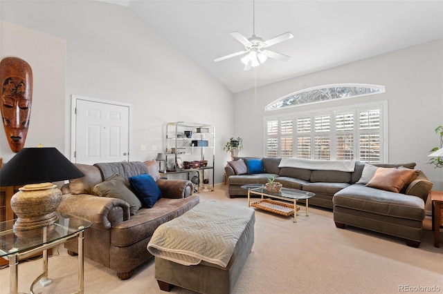 living room with light carpet, high vaulted ceiling, and ceiling fan