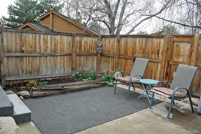 view of patio featuring a fenced backyard