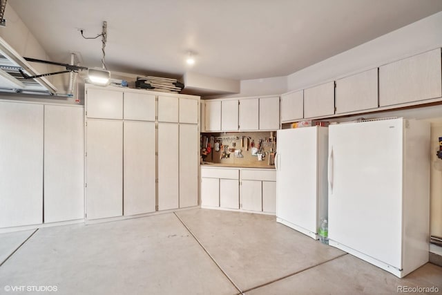 9445 Aspen Hill Cir, Lone Tree, CO 80124 - garage featuring freestanding refrigerator