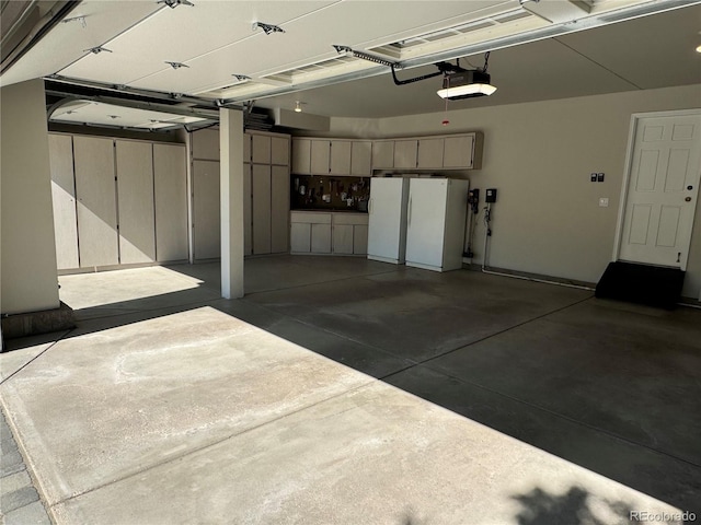 9445 Aspen Hill Cir, Lone Tree, CO 80124 - garage featuring a garage door opener