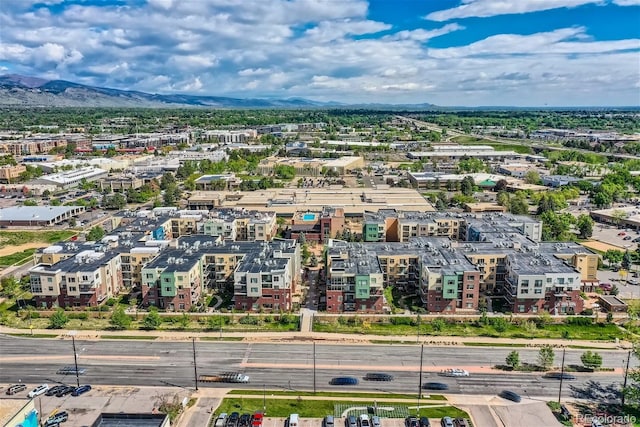 birds eye view of property featuring a mountain view