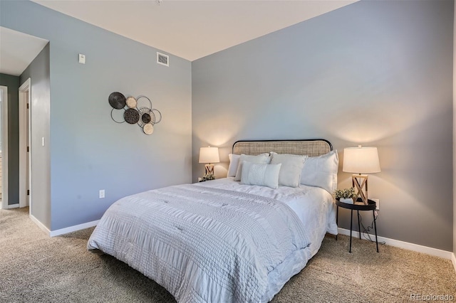 bedroom featuring carpet