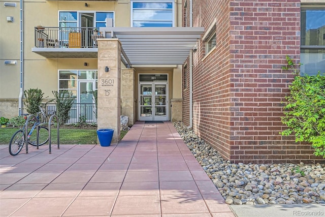 doorway to property featuring french doors and a balcony