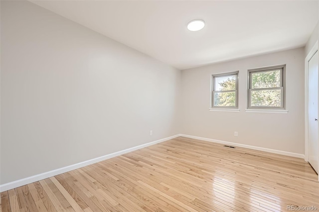 empty room featuring light hardwood / wood-style floors