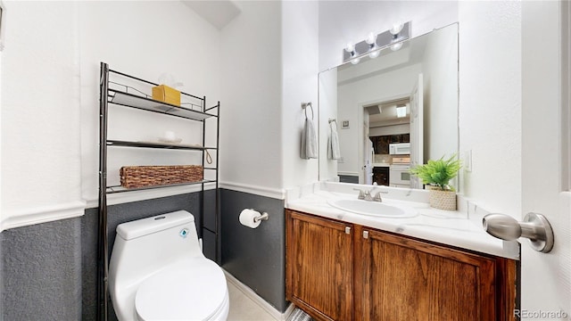 9758 Laredo St Unit 22D, Commerce City, CO 80022 - bathroom featuring toilet and vanity