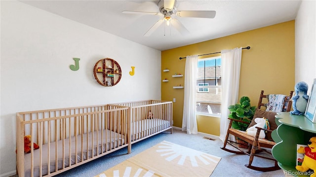 9758 Laredo St Unit 22D, Commerce City, CO 80022 - bedroom with carpet, a nursery area, visible vents, ceiling fan, and baseboards