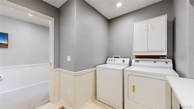 9758 Laredo St Unit 22D, Commerce City, CO 80022 - laundry area with washing machine and dryer, recessed lighting, cabinet space, and a textured wall