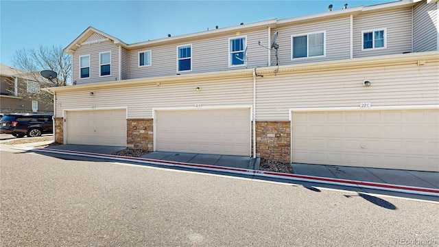 9758 Laredo St Unit 22D, Commerce City, CO 80022 - view of garage