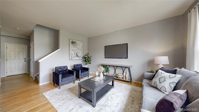 9758 Laredo St Unit 22D, Commerce City, CO 80022 - living area with light wood-style floors