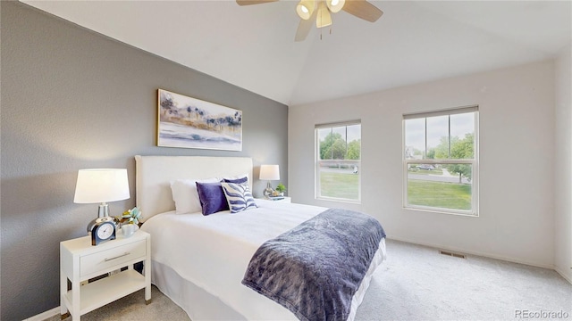 9758 Laredo St Unit 22D, Commerce City, CO 80022 - bedroom with carpet flooring, vaulted ceiling, and ceiling fan