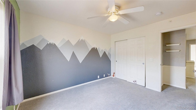 9758 Laredo St Unit 22D, Commerce City, CO 80022 - unfurnished bedroom with carpet, a closet, and ceiling fan
