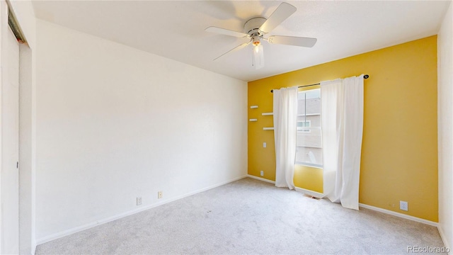 9758 Laredo St Unit 22D, Commerce City, CO 80022 - carpeted empty room featuring ceiling fan and baseboards