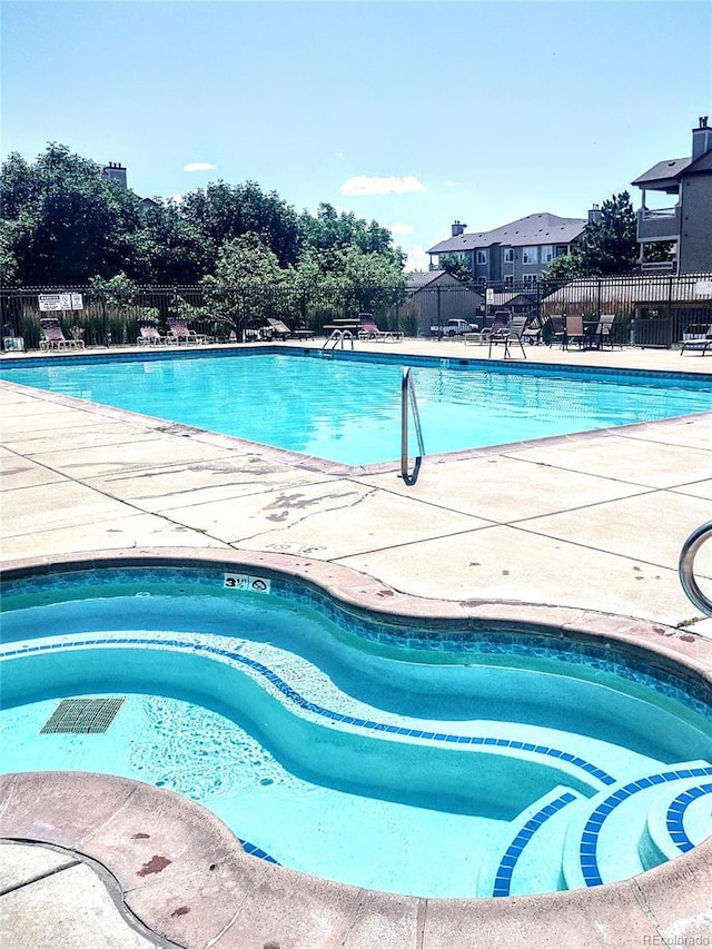 community pool with fence