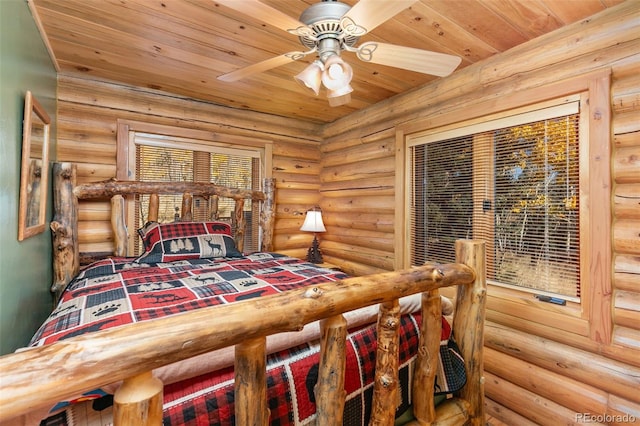 bedroom with wood ceiling and rustic walls