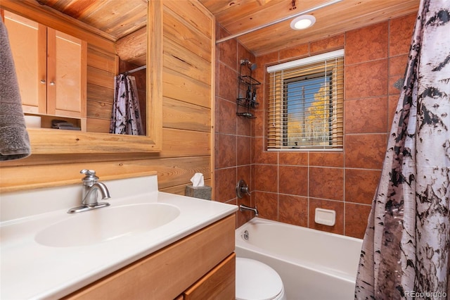 full bathroom featuring wood walls, vanity, toilet, wooden ceiling, and shower / bath combo with shower curtain