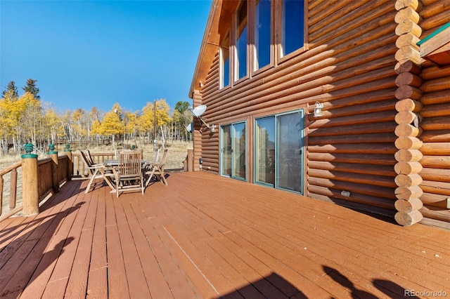 1052 Boreas Cir, Jefferson, CO 80456 - wooden deck featuring outdoor dining space