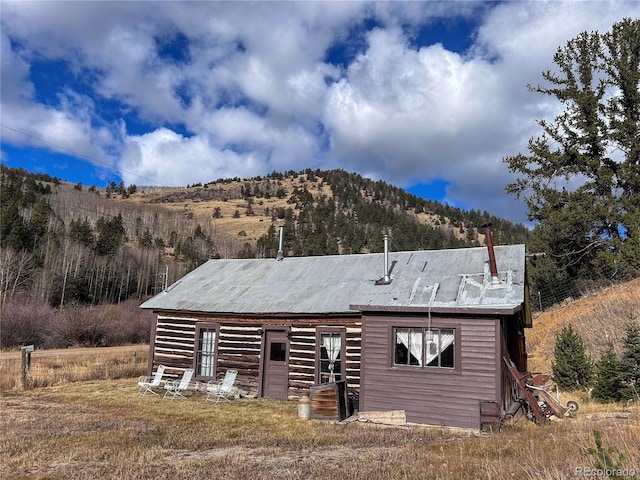 exterior space featuring a mountain view