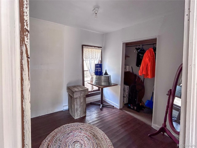 316 S Main, Bonanza, CO 81155 - bedroom featuring wood finished floors and baseboards