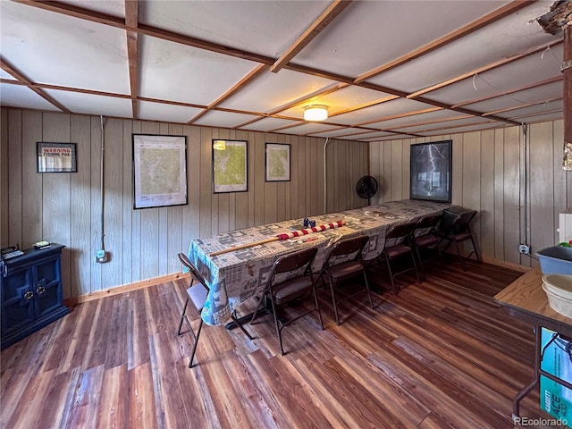 game room featuring wood walls, coffered ceiling, and dark hardwood / wood-style flooring